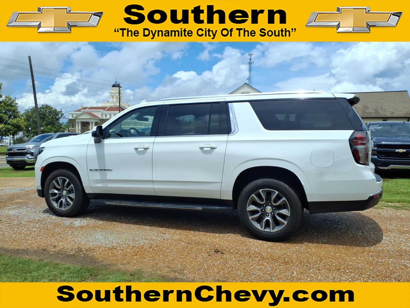 2022 Chevrolet Suburban LT in Summit White — front three-quarter view